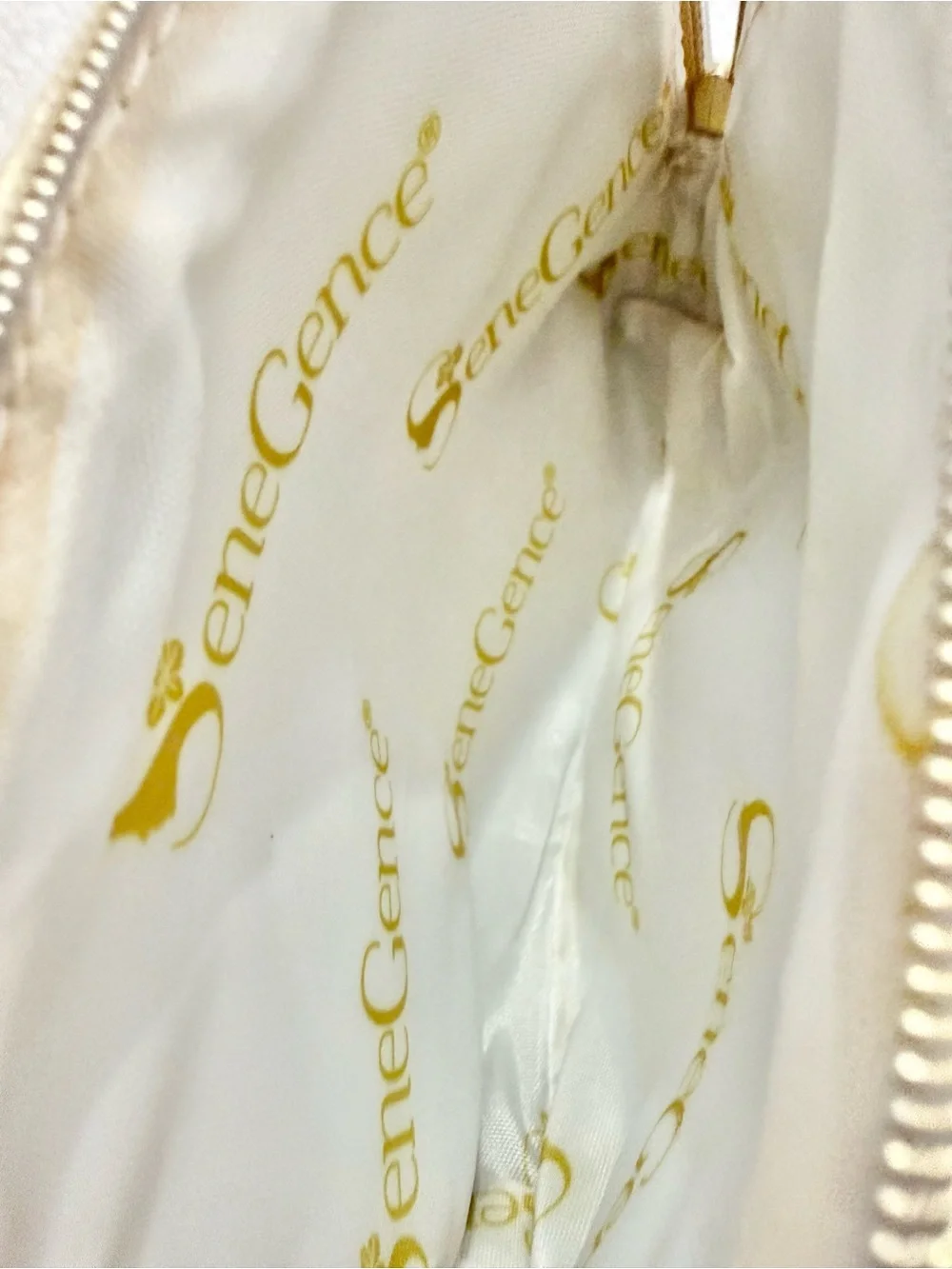 SeneGence Gold Cosmetic Pouch with Tassel and Lip Embossed, New Without Tags